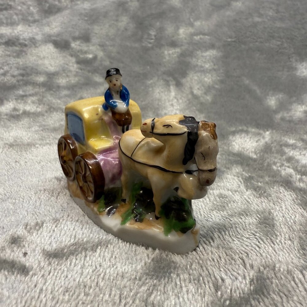 Vintage porcelain figurine of horse draw carriage made in occupied Japan